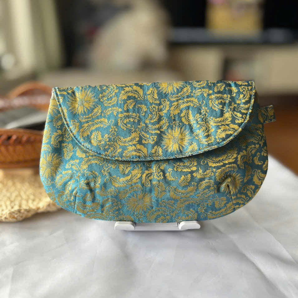 🌿 Handmade Fabric Clutch – Elegant & Versatile